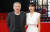 홍상수 감독(왼쪽)과 배우 김민희가 25일(현지시간) 독일 베를린영화제에서 경쟁 부문 진출작 '도망친 여자'의 최초 공개 상영회에 참석했다. [로이터=연합]