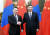 I지난달 27일 중국 베이징 인민대회당에서 칼트마 바툴가 몽골 대통령이 시진핑 중국 국가주석과 악수를 하고 있다. 바툴가 대통령은 귀국 직후 2주간 자가 격리에 들어갔다. [AP=연합뉴스] 