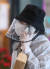 지난달 24일 인천국제공항 1터미널에서 입국한 한 중국인 유학생이 모자와 마스크, 얼굴 가리개, 비닐장갑과 우의 등으로 몸을 가린 채 휴대전화로 통화를 하고 있다. [연합뉴스]