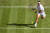 지난해 7월 영국 런던 윔블던의 올잉글랜드클럽에서 열린 윔블던 테니스대회 남자단식 경기에서 공을 받아넘기고 있는 라파엘 나달. AFP=연합뉴스