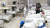 중국의 신종 코로나바이러스 감염자들이 지난 2월 5일 컨벤션 센터를 개조한 우한의 임시 병원에 수용돼 있는 모습. 연합뉴스