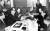 1971년 타워호텔에서 열린 남북적십자회담에서 김달술 남측 대표(왼쪽)와 한시혁 북측 대표가 합의문서에 서명한 뒤 교환하는 모습. [중앙포토]