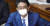 지난달 27일(현지시간) 일본 중의원 본회의에서 추가경정 예산안에 대한 심의가 본격적으로 시작된 가운데 아베 신조 일본 총리가 마스크를 착용하고 회의에 참석 중이다. [연합뉴스]