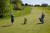 지난 5일 미국 워싱턴주 뉴캐슬의 한 골프장에 제이 인슬리 워싱턴주 주지사(오른쪽)가 레슬링 마스크를 쓴 한 골퍼와 라운드를 하고 있다. [로이터=연합뉴스]