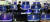 10일 오전 서울 용산 전자랜드에서 상인들이 문재인 대통령의 취임 3주년 대국민 특별연설을 시청하고 있다. 뉴스1