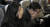 고(故) 김민식 군의 부모 김태양(오른쪽)·박초희 씨가 지난해 12월 10일 국회 본회의장에서 민식이법이 통과되자 눈물을 흘리고 있다. 김경록 기자