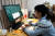 지난 2월 중국 허베이성 한단시에서 한 학생이 온라인으로 수업을 듣고 있다.[신화=연합뉴스]