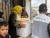 [레바논 난민캠프의 시리아 난민여성이 밀알복지재단으로부터 식량키트를 배분받고 있다.(사진제공=밀알복지재단)]