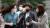 정경심 동양대 교수(가운데)가 4일 서울중앙지방법원에서 열린 재판에 출석하고 있다. [뉴스1]