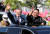 문재인 대통령과 김정은 국무위원장이 2018년 9월 18일 오전 평양 시내를 카퍼레이드 하며 평양 시민들에게 손을 들어 인사하고 있다. 평양사진공동취재단