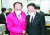 지난 3월 국회를 찾은 홍남기 경제부총리(오른쪽)가 추경호 통합당 의원과 대화하는 모습. [연합뉴스]