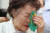 일본군 위안부 피해자 이용수 할머니가 6일 대구 중구 서문로 희움 일본군 위안부 역사관에서 열린 '대구·경북 일본군 위안부 피해자 추모의 날' 행사에 참석해 눈물을 닦고 있다. 뉴스1