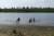 사하공화국 베르호얀스크의 한 호수에서 아이들이 물놀이를 하고 있다. AP=연합뉴스