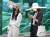 26일 오후 서울 강남역에서 열린 K거리두기운동본부 모델이 전통 선비갓에서 영감을 얻어 만든 거리두기 모자(K-god)를 착용하고 캠페인을 벌이고 있다.   [연합뉴스]