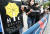 1일 오후 서울 강남 월트디즈니코리아 본사가 있는 건물 앞에서 청년들이 영화 '뮬란' 보이콧 선언 기자회견을 하고 있다. 연합뉴스