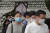 12일 서울시청 앞 광장에 마련된 고(故) 박원순 서울시장 시민분향소에 조문객들의 발걸음이 이어지고 있다. [AP=연합뉴스]