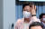 추미애 법무부 장관이 23일 청와대 여민관에서 열린 국무회의 및 수도권 방역 대책회의에서 손으로 머리결을 다듬고 있다. [청와대사진기자단]