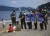 부산 해운대구청과 해운대경찰서, 주민단체 관계자들이 18일 오후 해운대해수욕장 일대에서 마스크 착용과 취식금지 계도활동을 벌이고 있다.뉴스1