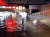 23일 많은 비가 내린 부산 동구 초량동 부산역 인근 제1지하차도에 출동한 소방대원들이 구조작업을 벌이고 있다. 사진 부산소방재난본부
