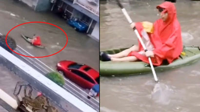 "환자는 누가 봐"…폭우로 잠긴 도로, 배 저어서 출근한 中의사
