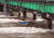 6일 오전 강원 춘천시 서면 의암댐 상부 500ｍ 지점에서 뒤집힌 것으로 추정되는 선박이 급류를 타고 수문으로 향하고 있다. 연합뉴스