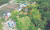 문재인 대통령 부부가 지난 4월 매입한 경남 양산시 하북면의 사저 부지와 2층짜리 주택(붉은 선). 전체 부지의 절반가량이 농지다. [연합뉴스]