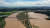  9일 오후 전남 나주 영산강 죽산보와 인근의 침수된 농경지 모습. 사진 왼쪽이 영산강 죽산보, 오른쪽은 폭우에 침수된 농경지다. 여전히 물이 빠지지 않아 벼논이 물속에 잠겨 있다.뉴스1