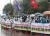 광복절인 15일 오후 열린 '민주노총 8·15 노동자대회' 참가자들이 서울 종로구 보신각 주변 곳곳에 모여 행사를 지켜보고 있다. 연합뉴스