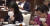25일 교토의 한 호텔에 모인 음식점 주인들이 한 손에 마스크를 들고 식사를 하고 있다. [사진 NHK 방송화면 캡처]