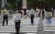 25일 오후 서울 양천구 목동 바람의 거리 광장에서 열린 WWF(Wear, Wash, Far away) 캠페인에서 참가자들이 마스크 쓰기, 손 씻기, 사회적 거리두기를 권장하는 피켓을 들고 있다. 연합뉴스