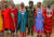 마사이족 전통의상을 입은 여성들과 함께 포즈를 취한 '팀 암사자'의 멤버 [로이터=연합뉴스]