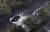 제10호 태풍 '하이선'이 부산에 접근 중인 7일 오전 부산 해운대구 센텀시티에서 차량이 침수된 도로를 물보라를 일으키며 서행하고 있다. 연합뉴스