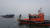 지난 5일 오전 충남 홍성군 천수만 해상에서 승객 18명을 태운 낚싯배가 암초에 좌초된 뒤 아슬아슬하게 걸려 있다. [사진 보령해경]