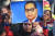 카스트 차별을 금지한 인도 헌법을 만든 인도의 전 법무장관인 빔라오 람지 암베드카르(그림 속 인물)는 인도 불가촉천민들에게는 영웅으로 추앙받는다. 지난해 인도에서 한 집회에 참석한 여성이 그의 초상화를 들고 있다. [AFP=연합뉴스]