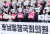 김종인 국민의힘 비대위원장과 국민통합위원회 의원들이 23일 국회 본청 앞에서 '호남동행 국회의원 발대식'을 열고  있다. 오종택 기자