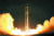 북한이 2017년 11월 29일자 노동신문을 통해 공개한 신형 대륙간탄도미사일(ICBM) '화성-15형' 시험발사 모습[연합뉴스]