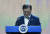 문재인 대통령이 24일 오후 경기 김포 캠프원에서 디지털 뉴딜 문화콘텐츠산업 전략보고회에서 모두발언을 하기위해 단상에 오르고 있다. [청와대 사진기자단]