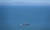 25일 해양수산부 소속 공무원 이모(47)씨가 피격된 것으로 추정된 황해도 등산곶 해안이 보이는 연평도 인근 바다에서 해군 함정이 이동하고 있다. 연합뉴스