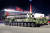 10일 북한 노동당 창건 75주년 기념 열병식에서 11축 22륜(바퀴 22개)의 이동식 미사일 발사대(TEL)에 실린 신형 ICBM이 공개됐다. [평양 노동신문=뉴스1]