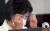 추미애 법무부 장관이 지난 13일 서울 세종대로 정부서울청사에서 열린 국무회의에서 안경을 쓰고 있다. [뉴스1]