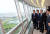 문재인 대통령(왼쪽 세번째)이 김영록 전남지사(왼쪽 두번째)와 지난 7월 12일 나주 빛가람전망대에서 한전공대 부지를 보고 있다. 연합뉴스