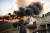 27일(현지시간) 미국 캘리포니아주 오렌지카운티 민가 인근까지 다가온 산불 모습. EPA=연합뉴스