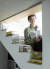 '집을 쫓는 모험' 저자 정성갑씨가 서울 종로구 누하동 자택 2층으로 올라가는 계단에서 자신의 책을 들고 포즈를 취했다. 권혁재 사진전문기자
