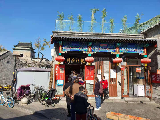 인파 북적 베이징 ‘바이든 식당’···자장면값 9년만에 3배 껑충