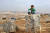 시리아 난민 소년이 고대 유적의 잔해 위에서 혼자 놀고 있다. AFP=연합뉴스