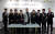 아트노믹스 본사에서 제휴 체결식을 진행 후 조성목 한국FPSB 부회장(왼쪽 네 번째), 김정필 아트노믹스 대표(가운데) 및 양사 관계자가 함께 기념 촬영을 하고 있다.