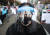 14일 오후 서울 영등포구 여의도공원 앞에서 전국노동자대회가 열려 집회 참가자가 페이스실드를 착용하고 있다. 연합뉴스