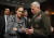 2010년 오바마 행정부 당시 미셸 플러노이(왼쪽) 국방부 정책 담당 차관이 해병대 부사령관을 지낸 존 팩스턴과 이야기를 나누고 있다. [AP=연합뉴스]
