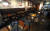  사회적 거리 두기 2단계가 시행중인 22일 경남 하동군 하동읍 한 식당 테이블 위로 의자가 놓여 있다. 연합뉴스