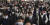24일 마스크를 쓴 시민들이 일본 도쿄 시나가와역을 지나고 있다. [EPA=연합뉴스]
